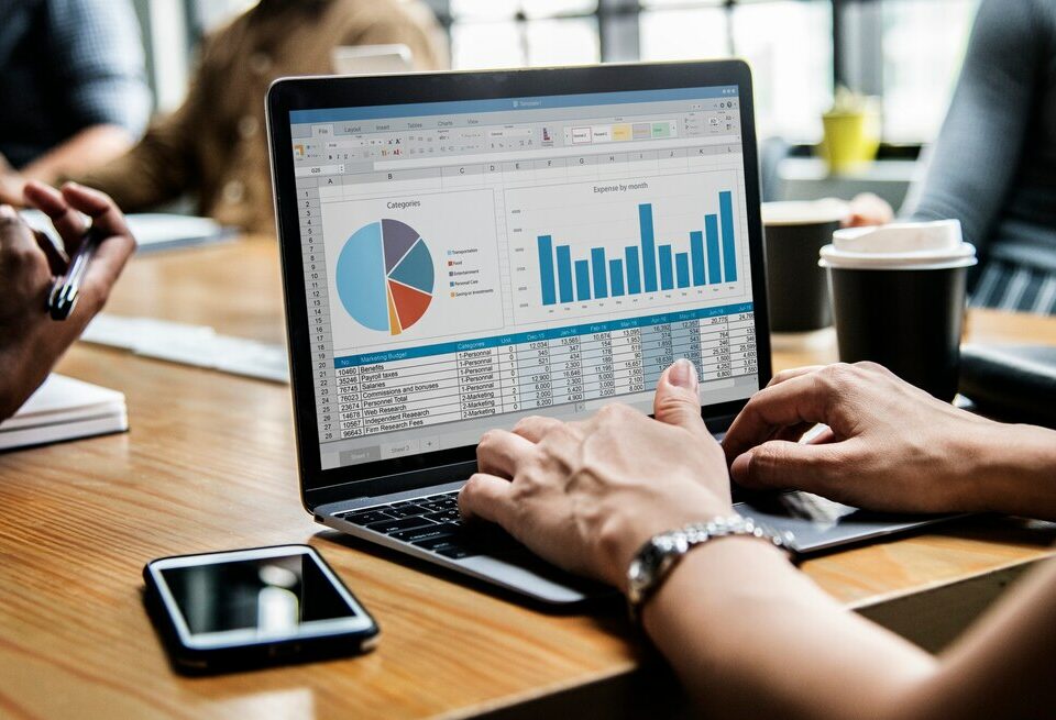 business people working laptop view grafics